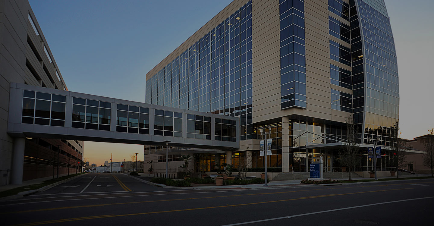 Orlando Health Village building at dusk