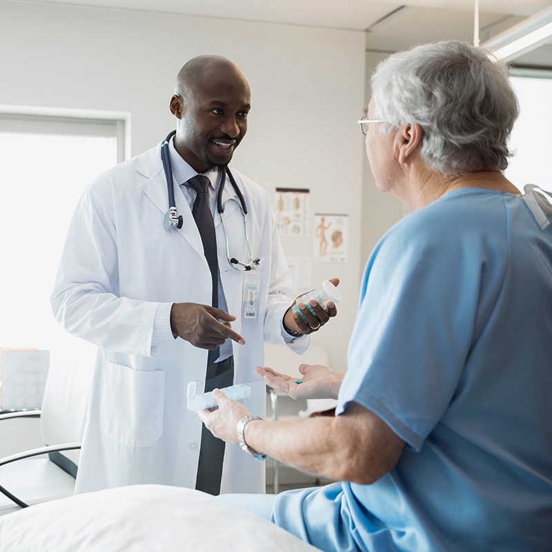 A doctor providing medication to a diabetic patient